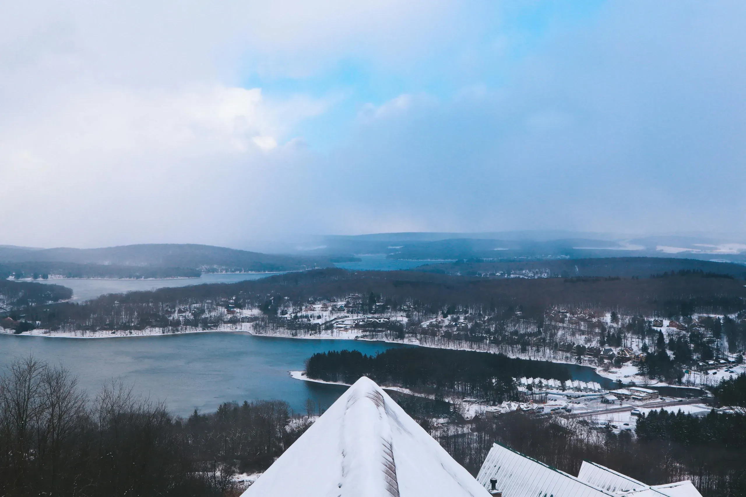 Maryland. Lake and village on winter day