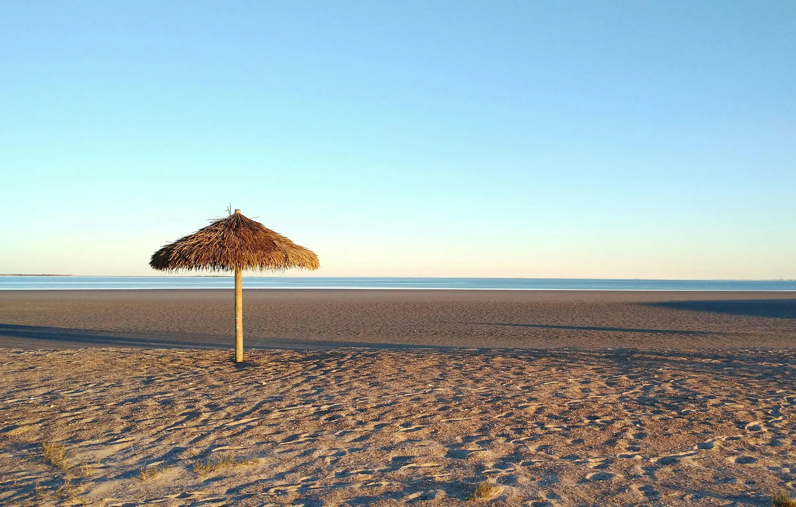 Port Lavaca, Texas. Serene beachscape with palm hut