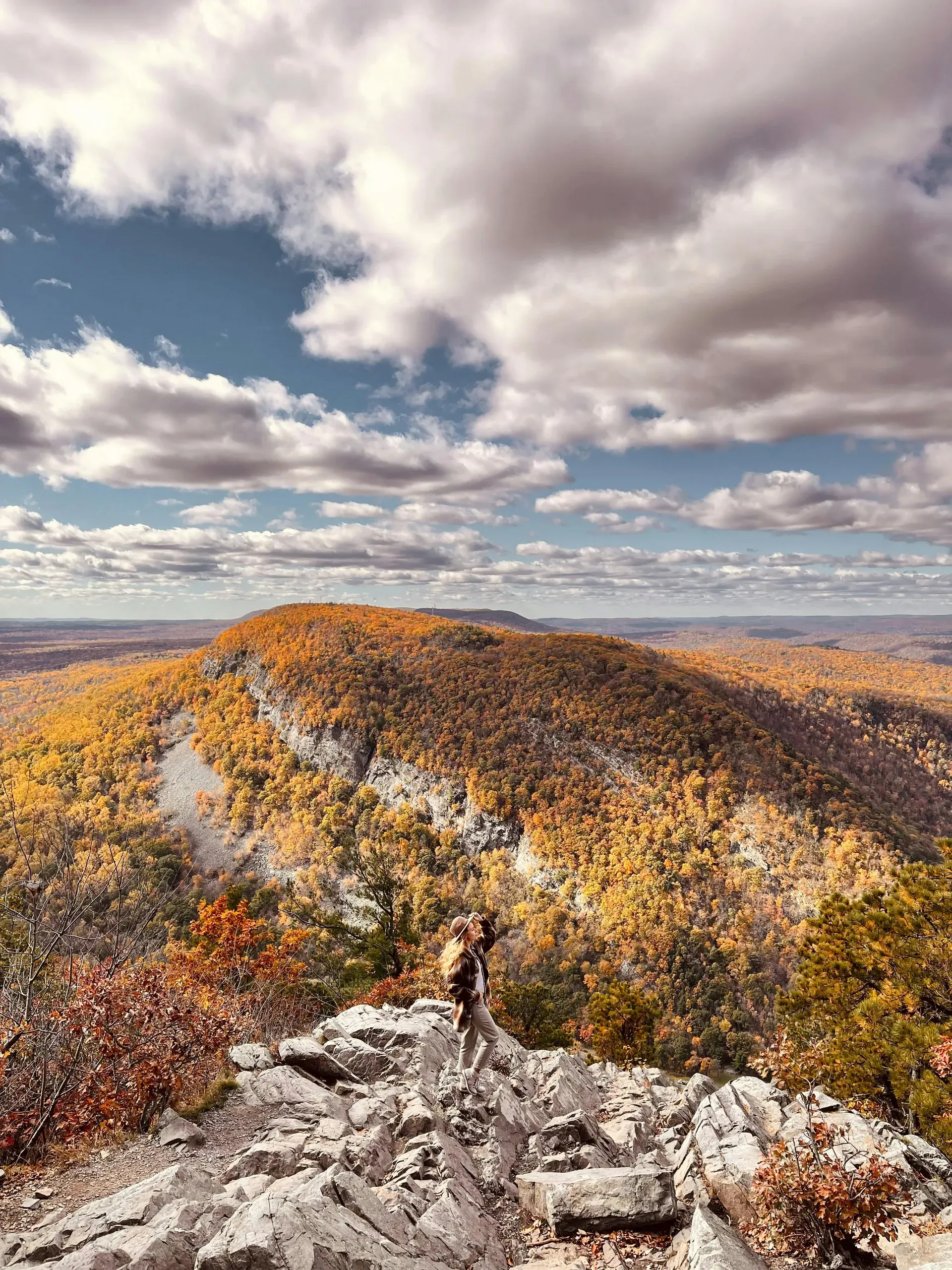 Delaware Water Gap, Pennsylvania. A woman standing on rocky mountain top