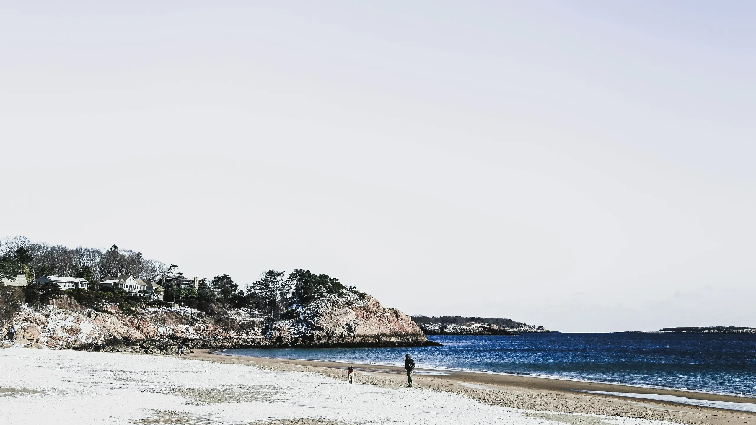 Manchester-by-the-Sea, Massachusetts. Person walking on seashore