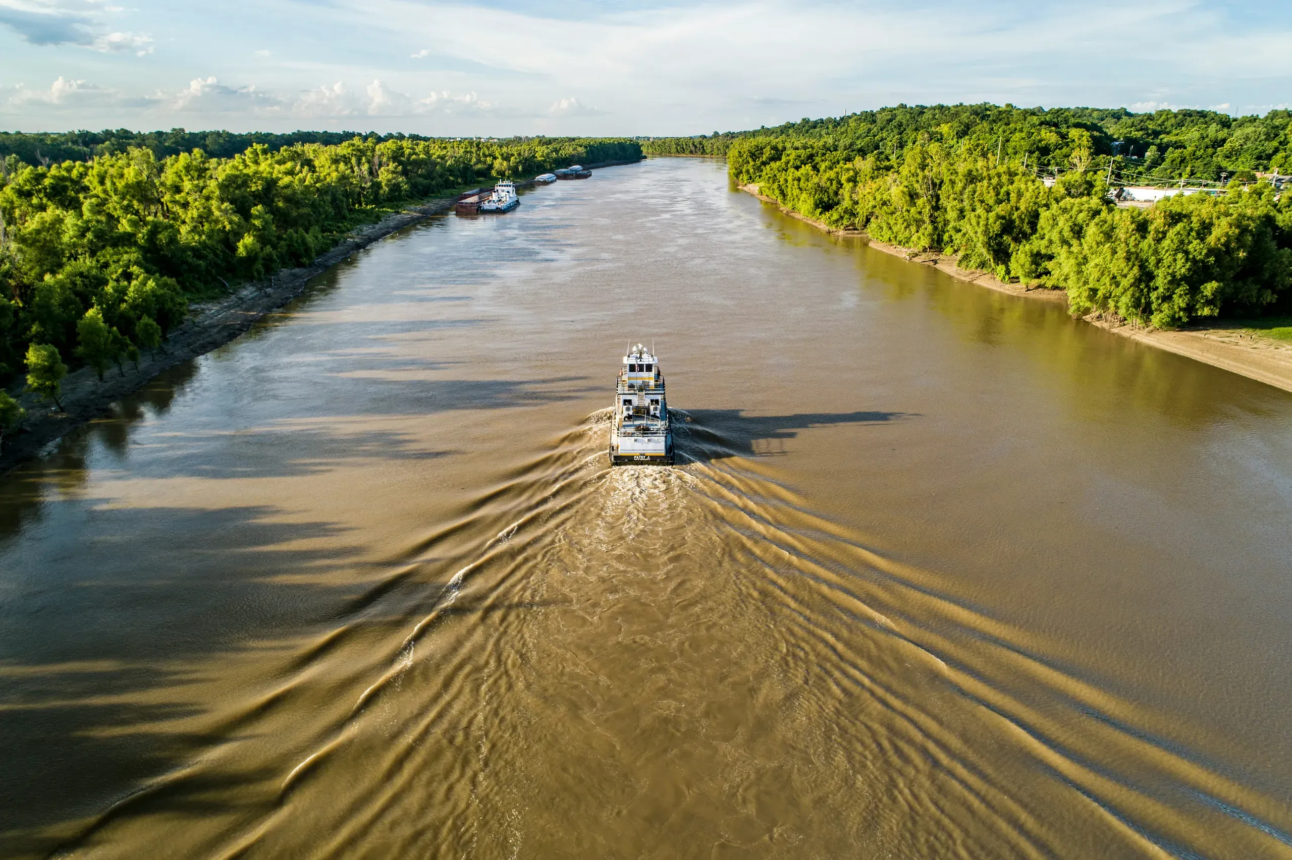 Tug going up the Yazoo River Diversion Canal towards the Port of Vicksburg, Mississippi