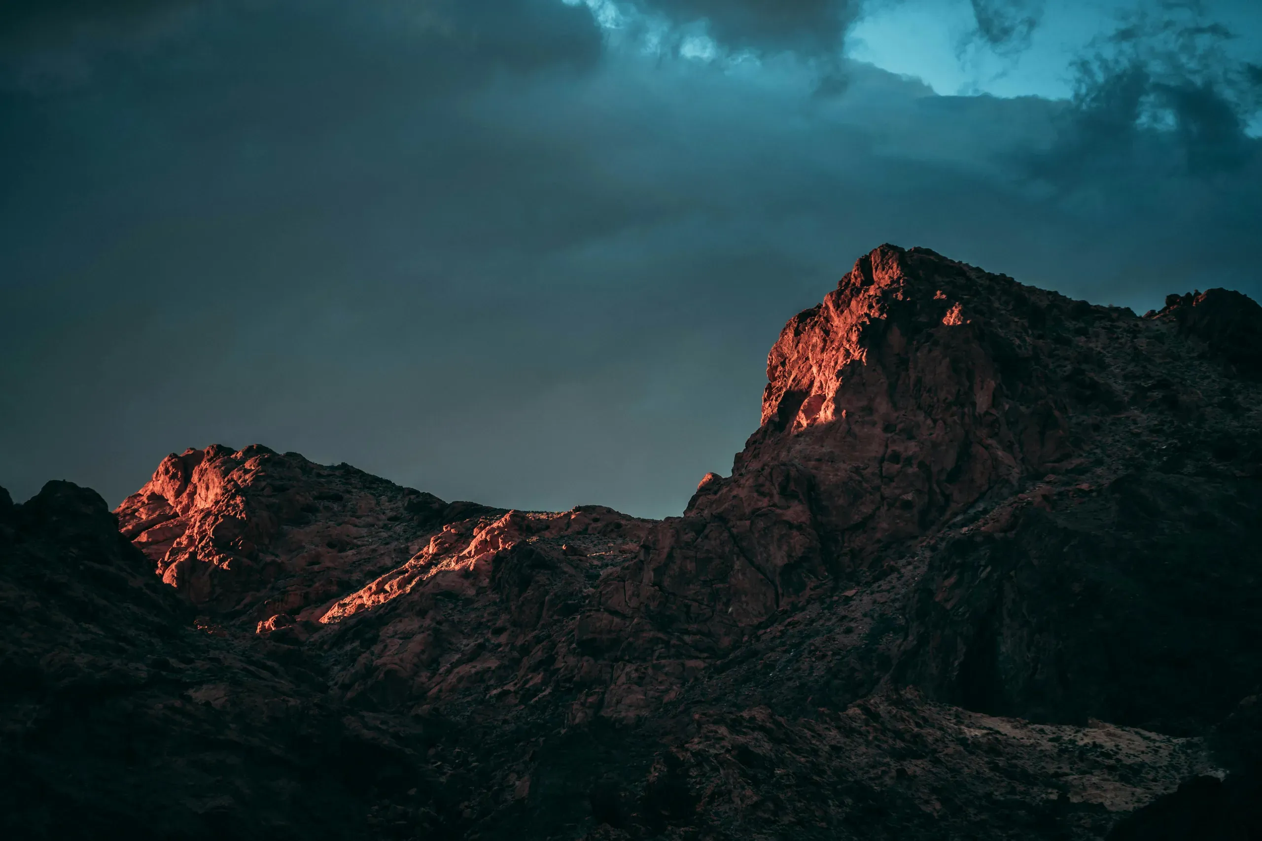 Nevada. Low-angle photography of rock mountain under cloudy sky