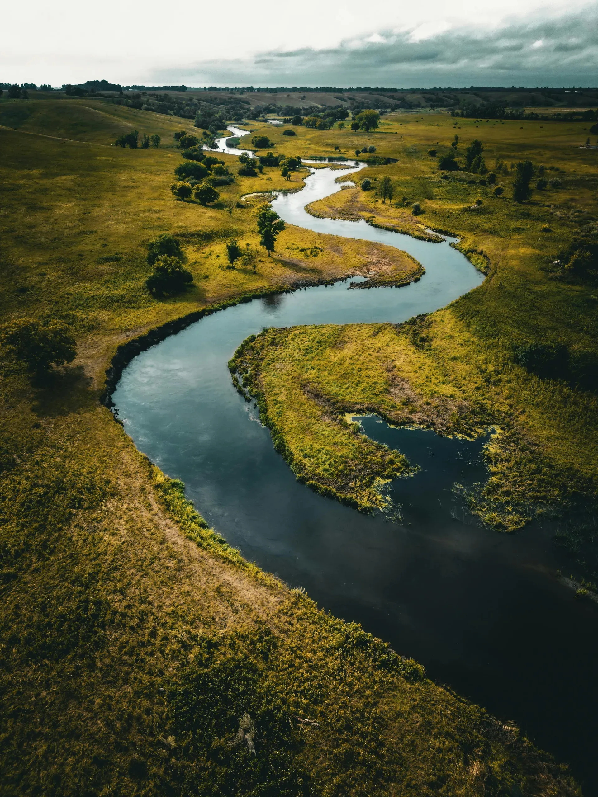River in green countryside.Jamestown, North Dakota