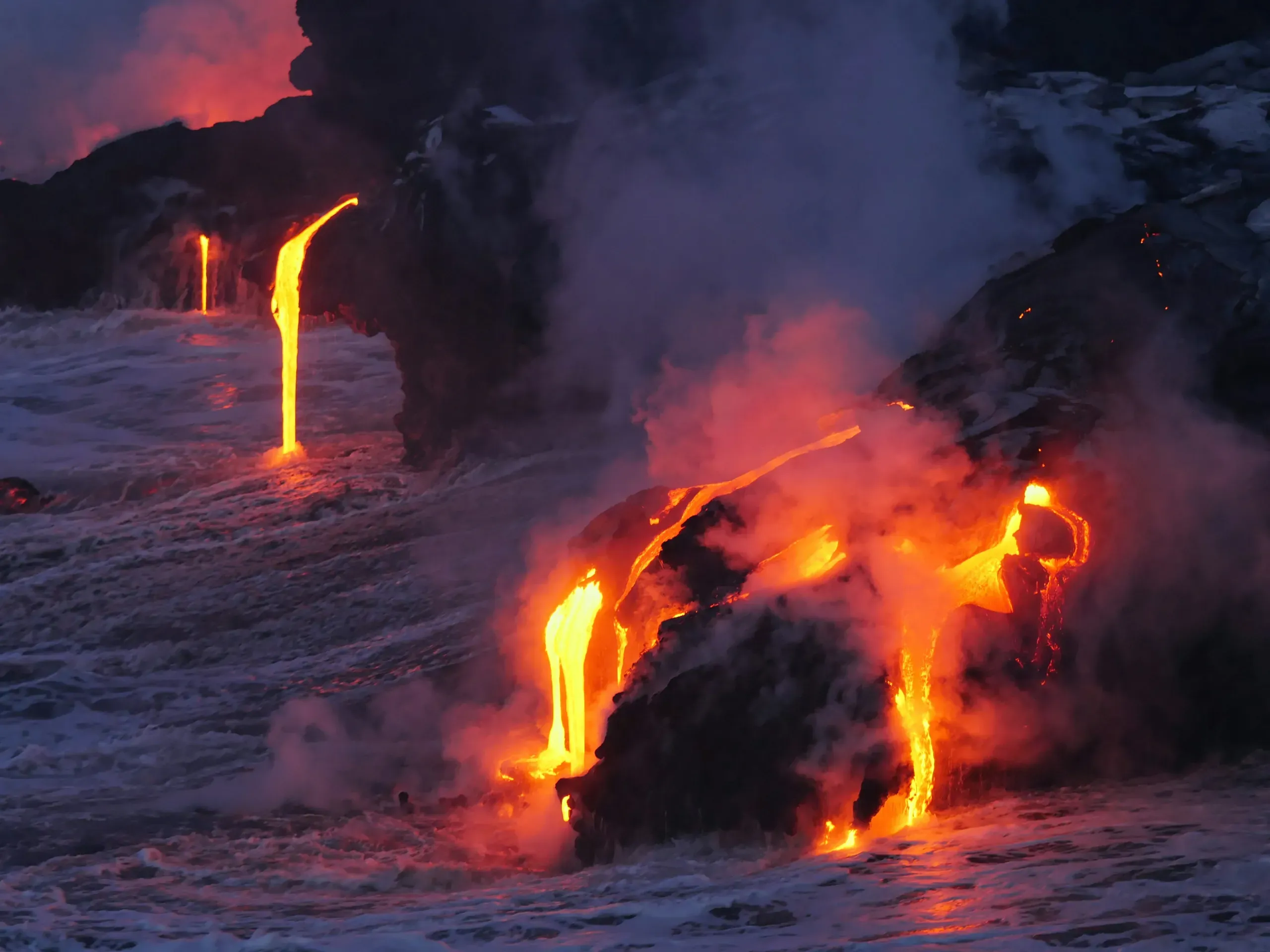Lava from Kilauea on Hawaii flows into the ocean