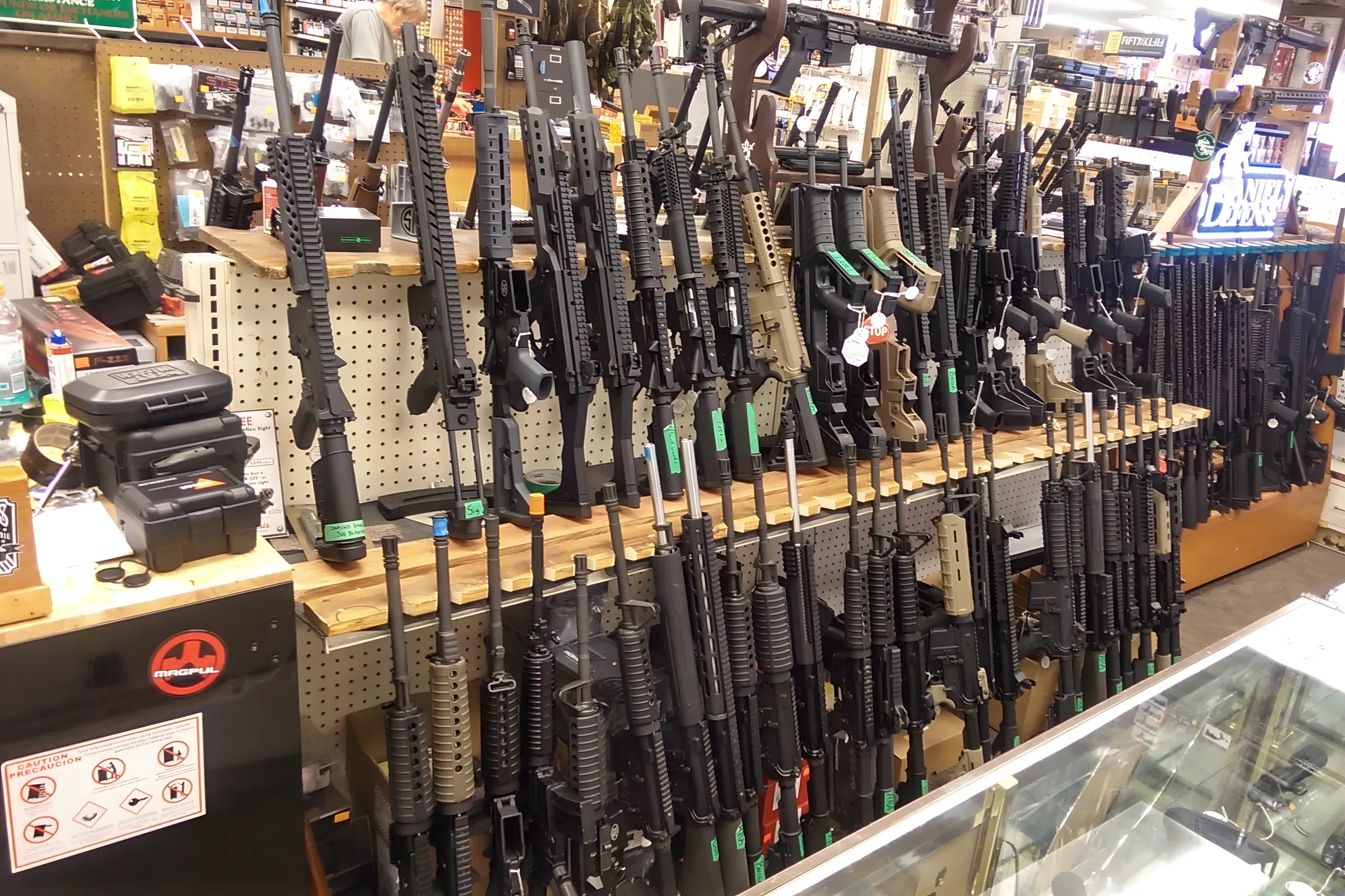 A rack of various assault rifles, mostly AR-15s, in Gallenson's Gun Shop in Salt Lake City, Utah, USA