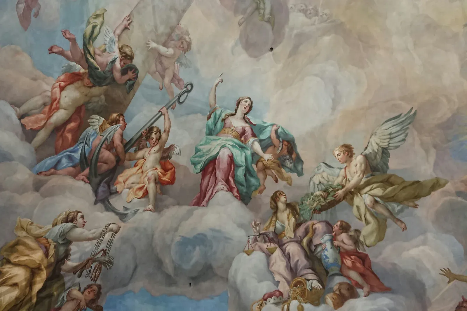 Baroque ceiling fresco of angels and figures ascending through clouds