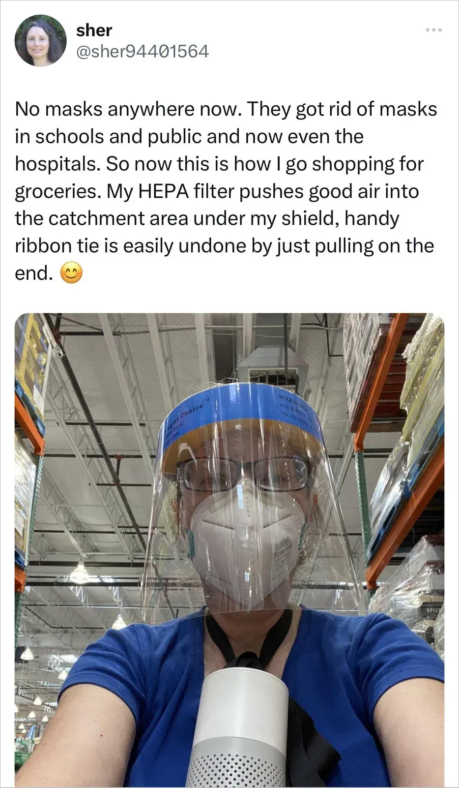 Tweet from @sher94401564 wearing face shield plus N95 plus portable HEPA filter attached to mask, describing their grocery shopping protection setup