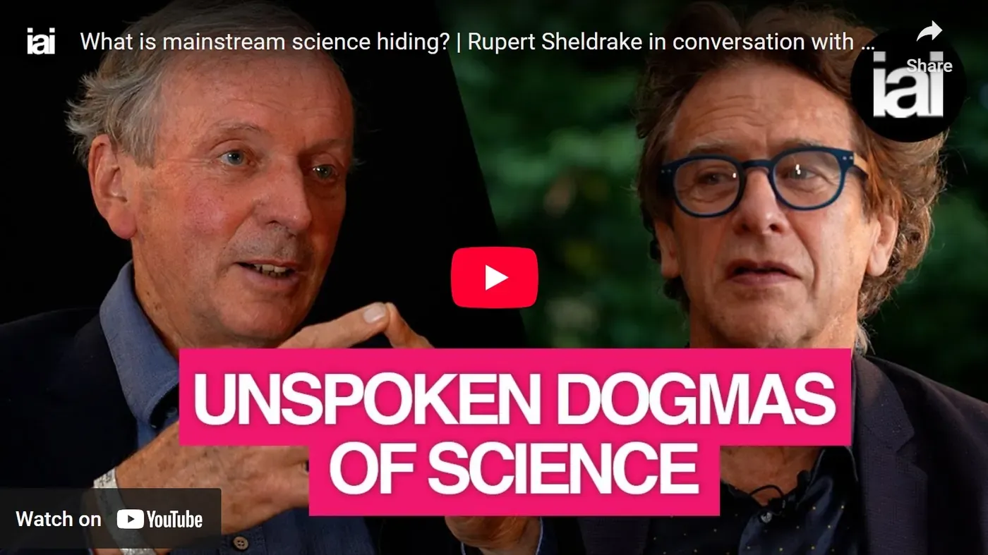 YouTube thumbnail for IAI video 'Unspoken Dogmas of Science' showing Rupert Sheldrake and Hilary Lawson in conversation