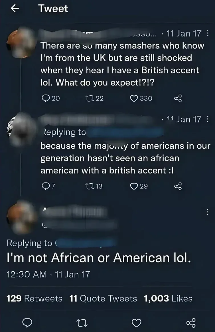 Twitter thread. First tweet (11 Jan 17): "There are so many smashers who know I'm from the UK but are still shocked when they hear I have a British accent lol. What do you expect!?!?" Reply (11 Jan 17): "because the majority of americans in our generation hasn't seen an african american with a british accent :l" Second person replies (12:30 AM, 11 Jan 17): "I'm not African or American lol."