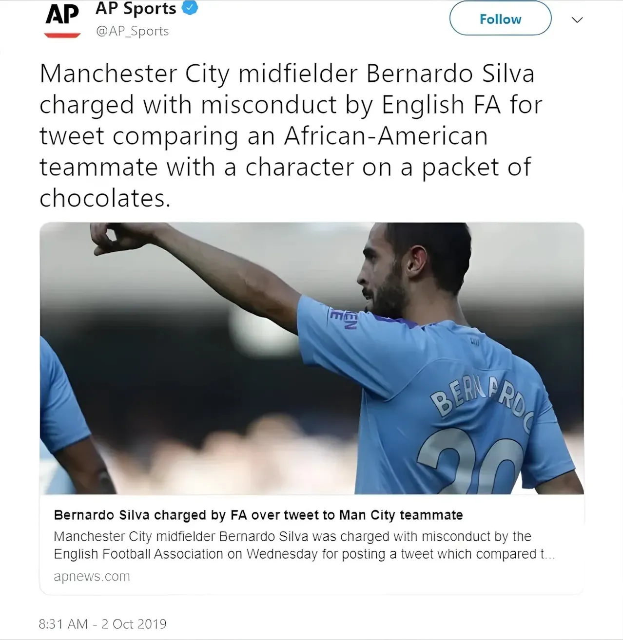 Twitter screenshot. @AP_Sports (AP Sports, verified): "Manchester City midfielder Bernardo Silva charged with misconduct by English FA for tweet comparing an African-American teammate with a character on a packet of chocolates." Photo of Bernardo Silva in Man City blue #20 shirt. Link preview from apnews.com. 8:31 AM - 2 Oct 2019