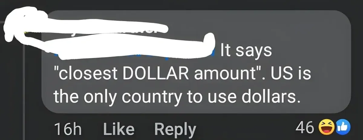 Facebook/social media comment (username redacted, 16h - laughing and thumbs up). Text: "It says 'closest DOLLAR amount'. US is the only country to use dollars."