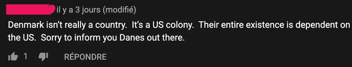 YouTube comment with French-language interface ("REPONDRE"). username redacted, 3 jours ago (modifie). Text: "Denmark isn't really a country. It's a US colony. Their entire existence is dependent on the US. Sorry to inform you Danes out there.", thumbs down