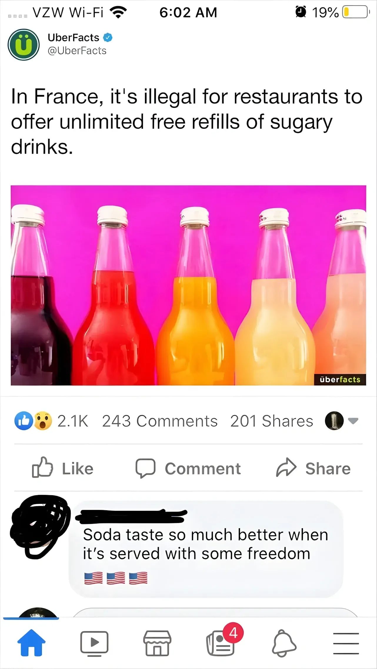 Facebook post on mobile (VZW Wi-Fi). UberFacts (@UberFacts, verified): "In France, it's illegal for restaurants to offer unlimited free refills of sugary drinks." Photo of colourful glass bottles of soda/juice on pink background. 2.1K reactions. Comment below (username scribbled out): "Soda taste so much better when it's served with some freedom" with two US flag emojis