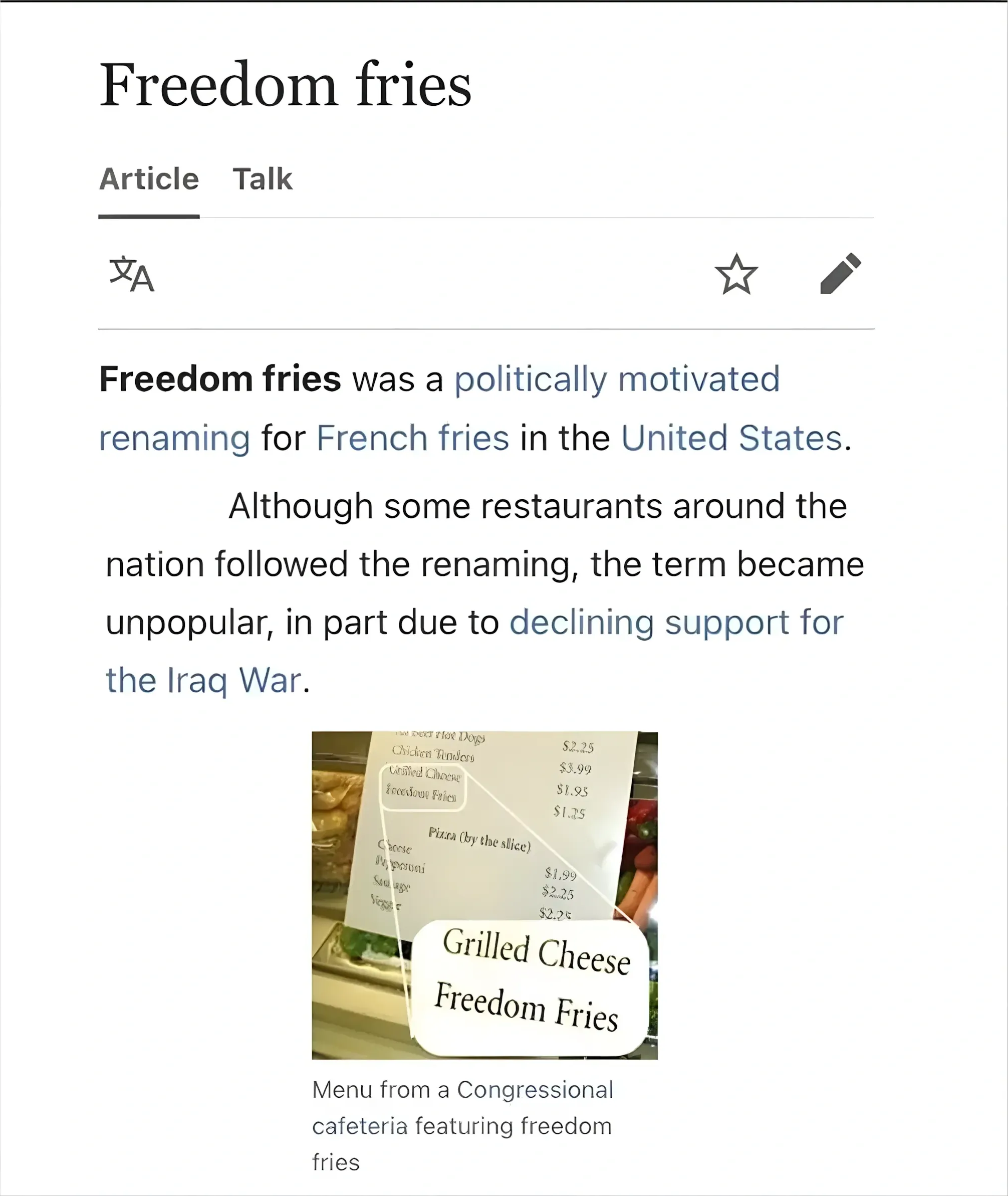 Wikipedia article screenshot. Title: "Freedom fries". Article, Talk tabs. Text: "Freedom fries was a politically motivated renaming for French fries in the United States. Although some restaurants around the nation followed the renaming, the term became unpopular, in part due to declining support for the Iraq War." Photo of a Congressional cafeteria menu showing "Grilled Cheese" and "Freedom Fries" with prices. Caption: "Menu from a Congressional cafeteria featuring freedom fries"