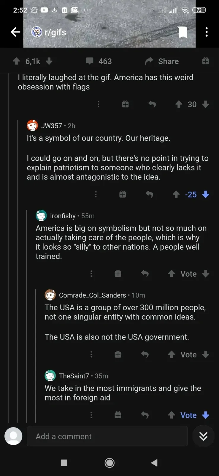 Reddit mobile app screenshot. r/gifs. Comment thread: First: "I literally laughed at the gif. America has this weird obsession with flags". JW357 (2h, -25 downvotes): "It's a symbol of our country. Our heritage. I could go on and on, but there's no point in trying to explain patriotism to someone who clearly lacks it and is almost antagonistic to the idea." Ironfishy (55m): "America is big on symbolism but not so much on actually taking care of the people, which is why it looks so 'silly' to other nations. A people well trained." Comrade_Col_Sanders (10m): "The USA is a group of over 300 million people, not one singular entity with common ideas. The USA is also not the USA government." TheSaint7 (35m): "We take in the most immigrants and give the most in foreign aid"