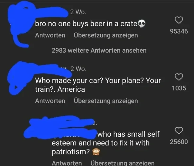 TikTok/Instagram comment thread with German-language interface ("Antworten", "Ubersetzung anzeigen"). Three comments. First (2 Wo.): "bro no one buys beer in a crate" with skull emoji. 2,983 further replies. Second (2 Wo.): "Who made your car? Your plane? Your train? America". Third (username redacted): "who has small self esteem and need to fix it with patriotism?" with face emoji