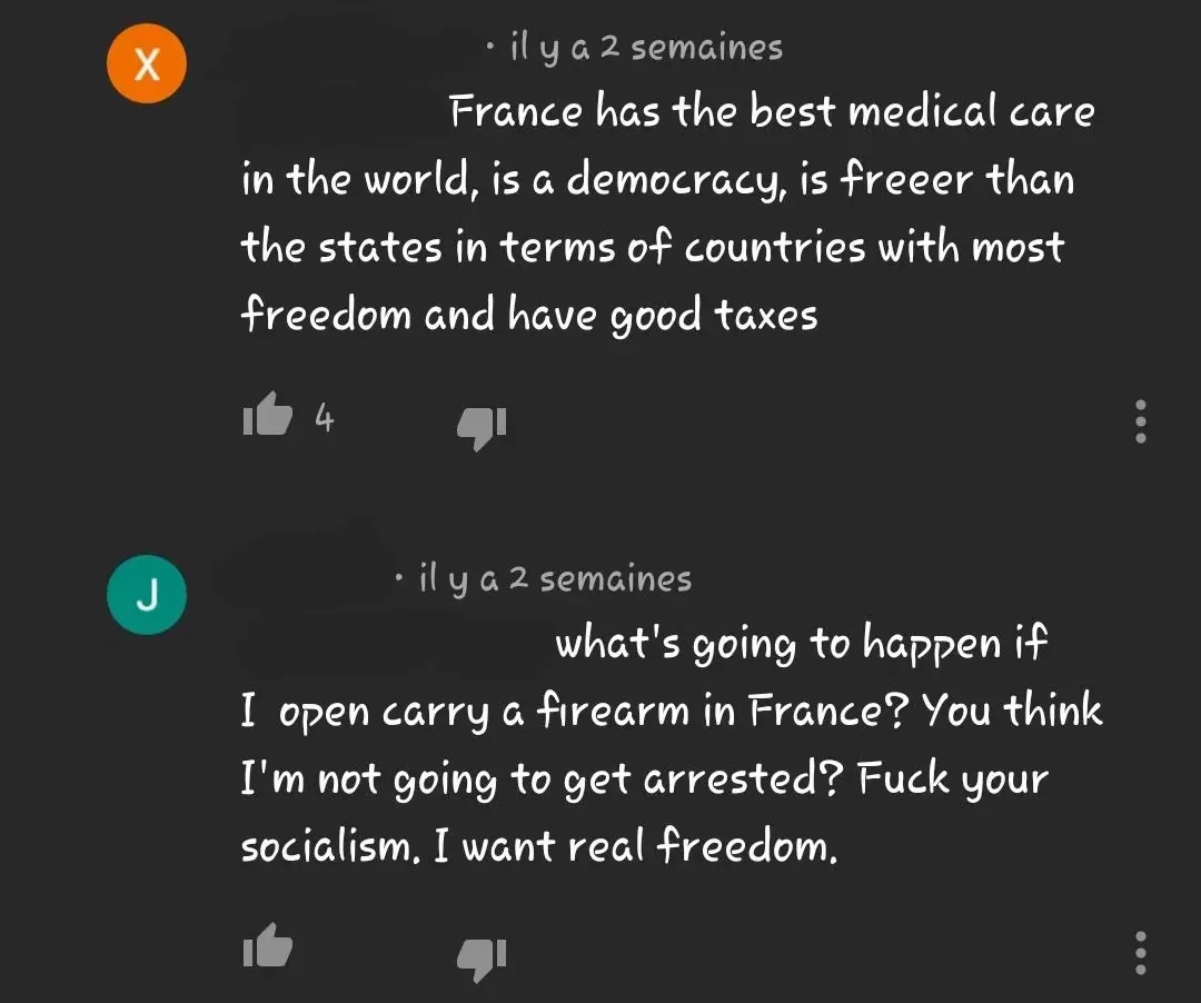 YouTube comment thread with French-language interface ("il y a 2 semaines"). Two comments. First (il y a 2 semaines): "France has the best medical care in the world, is a democracy, is freeer than the states in terms of countries with most freedom and have good taxes". Second (il y a 2 semaines): "what's going to happen if I open carry a firearm in France? You think I'm not going to get arrested? Fuck your socialism. I want real freedom."