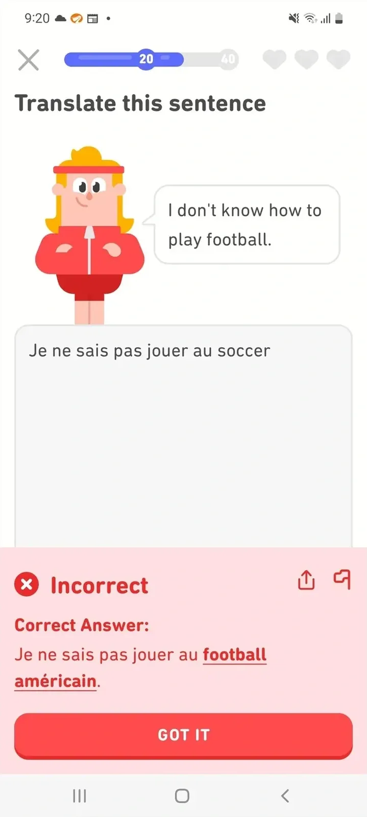 Duolingo French translation exercise on mobile. Cartoon character in red sports outfit with speech bubble: "I don't know how to play football." User typed: "Je ne sais pas jouer au soccer". Red Incorrect banner. Correct Answer: "Je ne sais pas jouer au football americain." Progress bar at 20/40