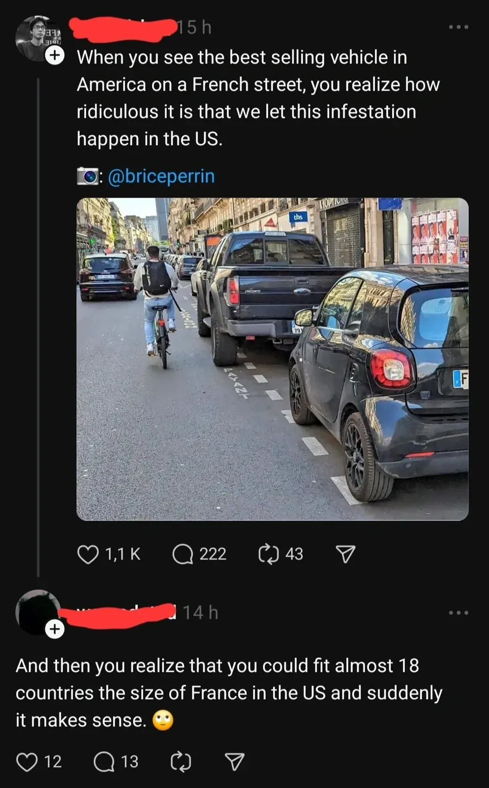Twitter/X thread. First post (username redacted, 16h): "When you see the best selling vehicle in America on a French street, you realize how ridiculous it is that we let this infestation happen in the US." Credit @briceperrin. Photo shows a narrow Parisian street with a cyclist and small European cars, dwarfed by one massive American pickup truck. Reply (14h): "And then you realize that you could fit almost 18 countries the size of France in the US and suddenly it makes sense."