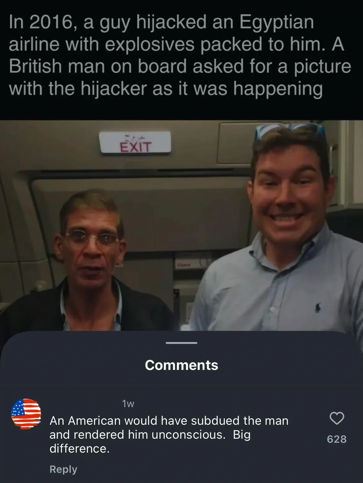 Instagram/TikTok post with photo and comments overlay. Top text: "In 2016, a guy hijacked an Egyptian airline with explosives packed to him. A British man on board asked for a picture with the hijacker as it was happening". Photo shows two men inside an aircraft cabin near an EXIT sign - the hijacker (older man with glasses, looking uneasy) and the British passenger (younger blond man in blue shirt, grinning broadly). Comments section below: comment (US flag avatar, 1w): "An American would have subdued the man and rendered him unconscious. Big difference."