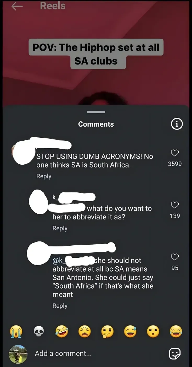 TikTok/Instagram Reels screenshot with red-lit background. Video title: "POV: The Hiphop set at all SA clubs". Comments section: first comment (username redacted): "STOP USING DUMB ACRONYMS! No one thinks SA is South Africa." Reply (username starting with k_): "what do you want to her to abbreviate it as?" Reply: "@k_ she should not abbreviate at all bc SA means San Antonio. She could just say 'South Africa' if that's what she meant"