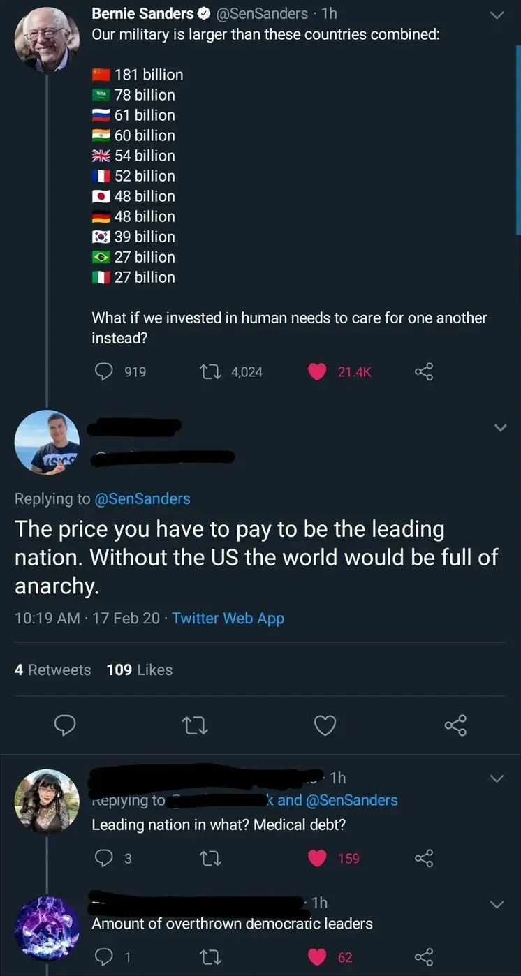 Twitter/X thread. Bernie Sanders (@SenSanders, 1h) tweet: "Our military is larger than these countries combined:" with list of 11 countries and flags showing military budgets from 181 billion down to 27 billion. "What if we invested in human needs to care for one another instead?". Reply (username scribbled out): "The price you have to pay to be the leading nation. Without the US the world would be full of anarchy." (10:19 AM, 17 Feb 20). Two replies below: "Leading nation in what? Medical debt?" (1h) and "Amount of overthrown democratic leaders" (1h).