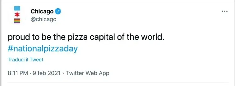 Tweet from Chicago @chicago (verified, Chicago city flag avatar) (Italian interface): proud to be the pizza capital of the world. #nationalpizzaday