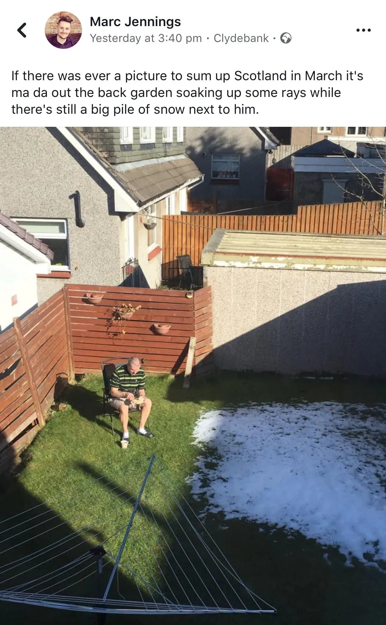 Marc Jennings Facebook post from Clydebank - If there was ever a picture to sum up Scotland in March it's ma da out the back garden soaking up some rays while there's still a big pile of snow next to him. Photo shows a man sitting in a garden chair on grass with a large mound of snow beside him