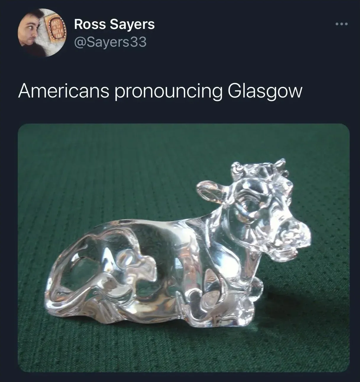 Ross Sayers @Sayers33 tweet - Americans pronouncing Glasgow. Photo of a glass cow ornament