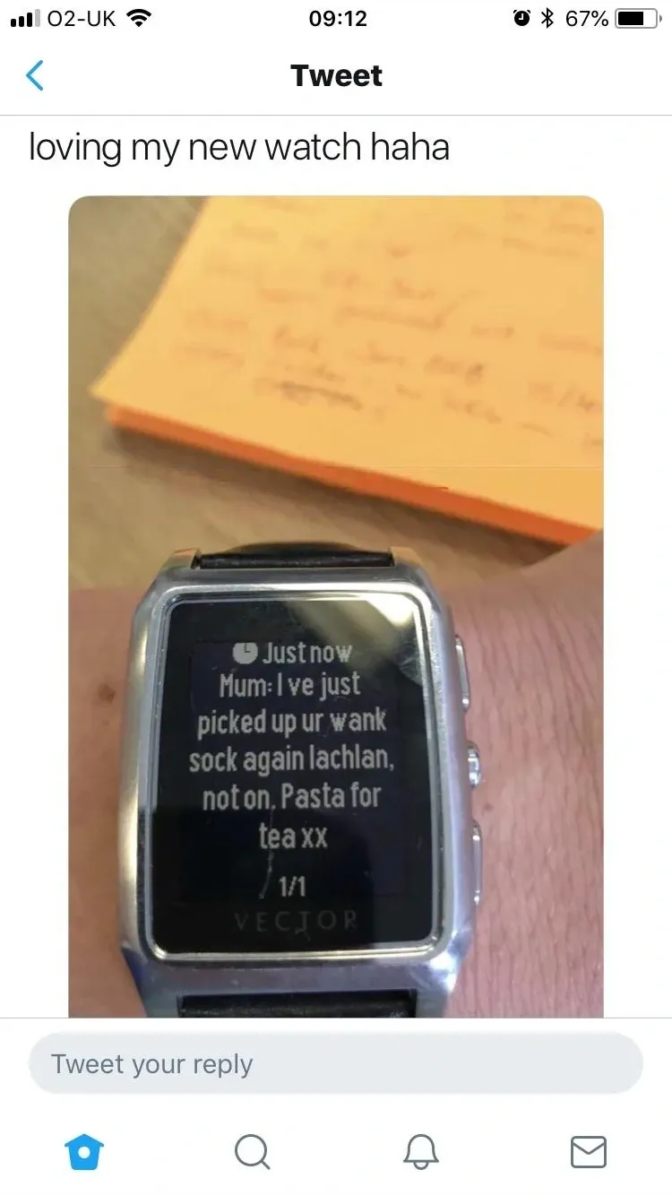 Tweet - loving my new watch haha. Photo of a smartwatch on someone's wrist showing a notification from Mum reading I've just picked up ur wank sock again lachlan, not on. Pasta for tea xx