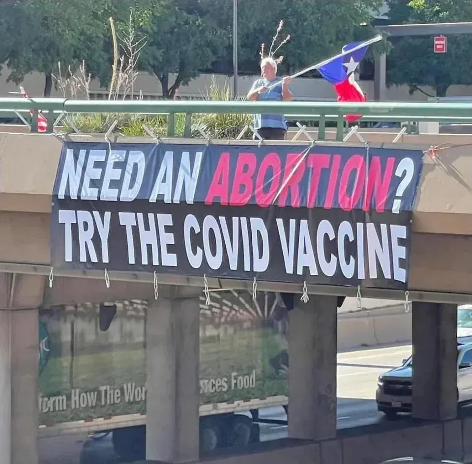 Highway banner - NEED AN ABORTION? TRY THE COVID VACCINE